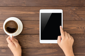Poster - female touch on white tablet blank screen on top view