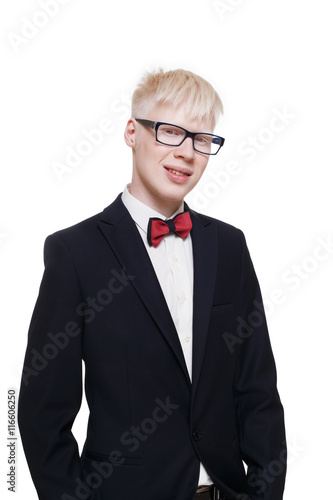 Fotografie, Obraz Albino young man portrait in eyeglasses and suit isolated.