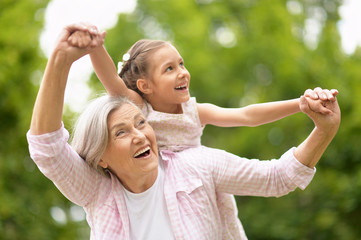 Sticker - Grandmother with granddaughter  in park