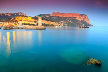 Wall Mural - Spectacular sunset with Cassis lighthouse and Cap Canaille cliffs,France,Europe