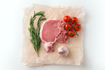 Wall Mural - Raw pork cutlet with spices for grill or cooking on white background