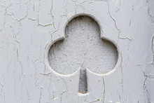 Old Grungy Shamrock Sign Shaped In A Wood Wall