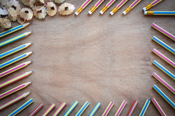 pencils with copyspace, on dark wooden background