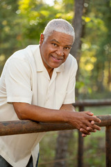 Senior African American man smiling.