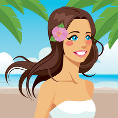 Wall Mural - Beautiful brunette woman with blowing long hair and flower on beach