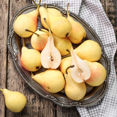 Wall Mural - ripe pears on vitage wooden table