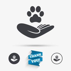 Canvas Print - Shelter pets sign icon. Hand holds paw symbol.