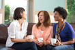© digitalskillet1 - Diverse group of friends having coffee
