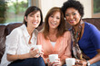 © digitalskillet1 - Diverse group of friends having coffee