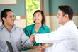 © digitalskillet1 - Doctor shaking hands with a patient.