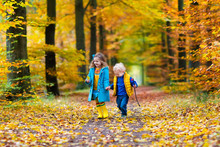 Kids Playing In Autumn Park