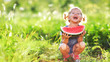 © JenkoAtaman - Happy child girl eats watermelon