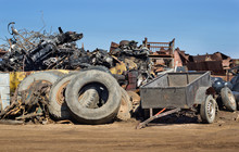 Tires And Metal Scraps On Pile