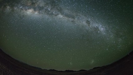 Wall Mural - Time Lapse of the stars moving across the night sky. Shot in Namibia.