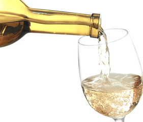 Poster - White wine pouring in glass, isolated on white