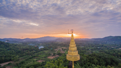 golden pagoda on hilltop this temple have several amazing building and famous in thailand.this temple is beside national park. the middle part of Thailand
