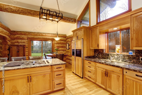 Log Cabin Kitchen Interior Design With Honey Color Cabinets