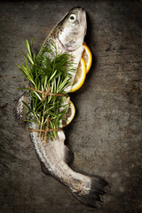 Wall Mural - Raw rainbow trout with lemon, herbs and spice