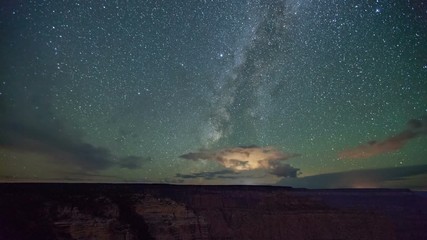 Wall Mural - Amazing time-lapse of the night sky above the Grand Canyon.
