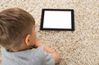 Close-up Of Boy And Digital Tablet