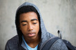 © digitalskillet1 - Sad African American teenager.