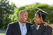 © digitalskillet1 - African American father and son at graduation.