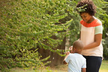 Wall Mural - African American mom and her son.