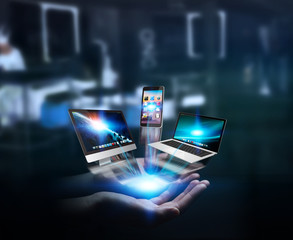 Wall Mural - Tech devices and icons connected to businesswoman hand
