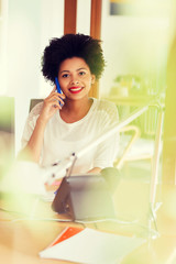 Wall Mural - businesswoman calling on smartphone at office