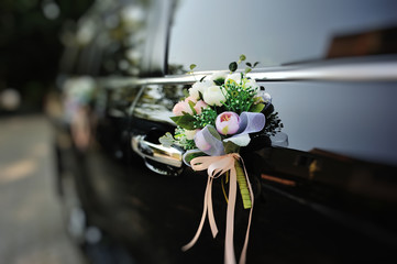 flowers arrangement on bridal car