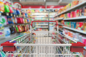 Canvas Print - shopping cart in supermarket alley