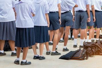 Wall Mural - thailand secondary education students are standing in line in th