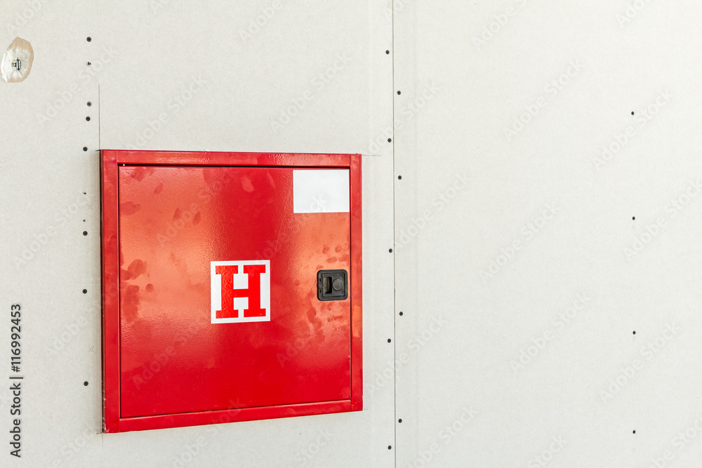 Box with symbol for fire hydrant is built in an unfinished plast Stock ...