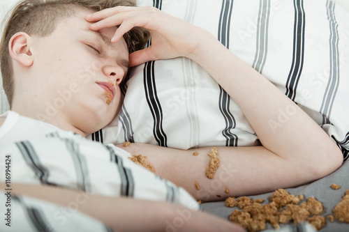 Fotografie, Obraz Teenage Boy Lying in Bed Covered in Vomit