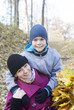 © lozochka - Mother and child in autumn park