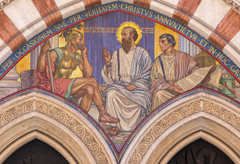  ROME, ITALY - MARCH 24, 2015: The mosaic Teaching of St. Paul in carcer by George Breck (1909) on the main portal of church Chiesa di San Paolo dentro le Mura.