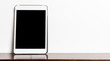 White Tablet on a shelf with white copy space