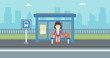 © Visual Generation - Woman waiting for bus at the bus stop.