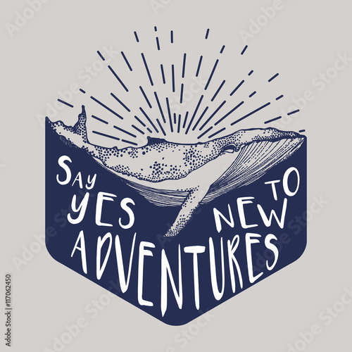 wieloryb-w-wodzie-z-napisem-say-yes-to-new-adventures