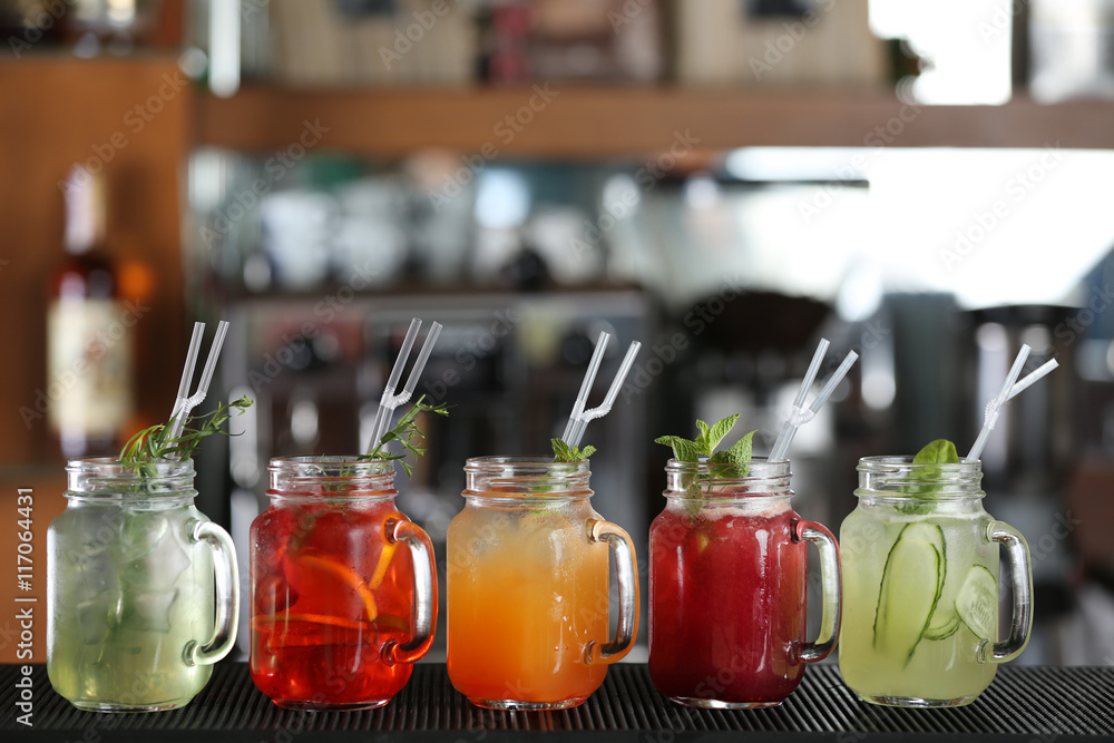 Different cocktails on table in cafe