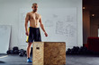 © baranq - Young athletic man standing befor box jump exercise at the gym