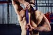 © baranq - Closeup of  young man during mobility exercise stretching arms w