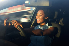 Young African American Woman Driving A Car