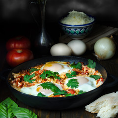 Breakfast with Turkish spicy shakshuka, still life