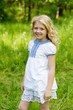 © Nadya Kolobova - Portrait cute blonde girl outdoors in summer