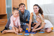 © JackF - Parents and daughters with toy lotto