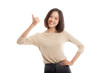 © halfbottle - Young Asian business woman show thumbs up