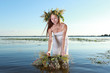© prohor08 - девушка в воде с венком