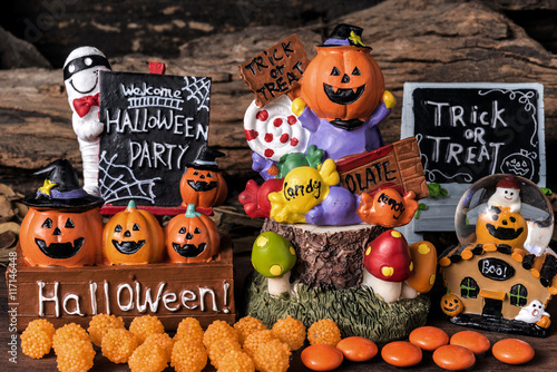 Halloween ornament party with orange candy and trick or treat