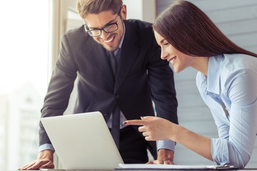 Beautiful business couple working